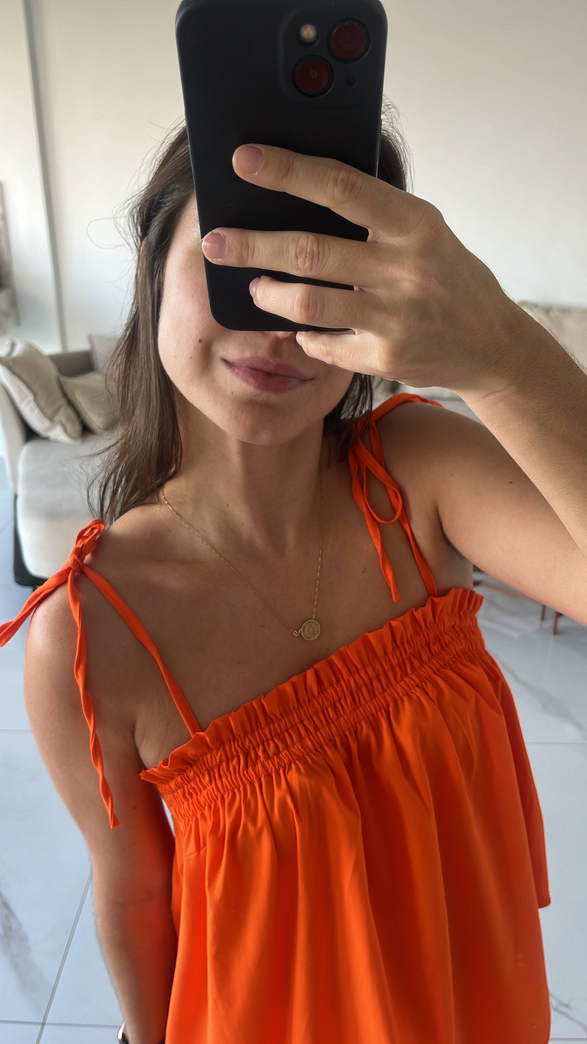 Bata assimétrica laranja