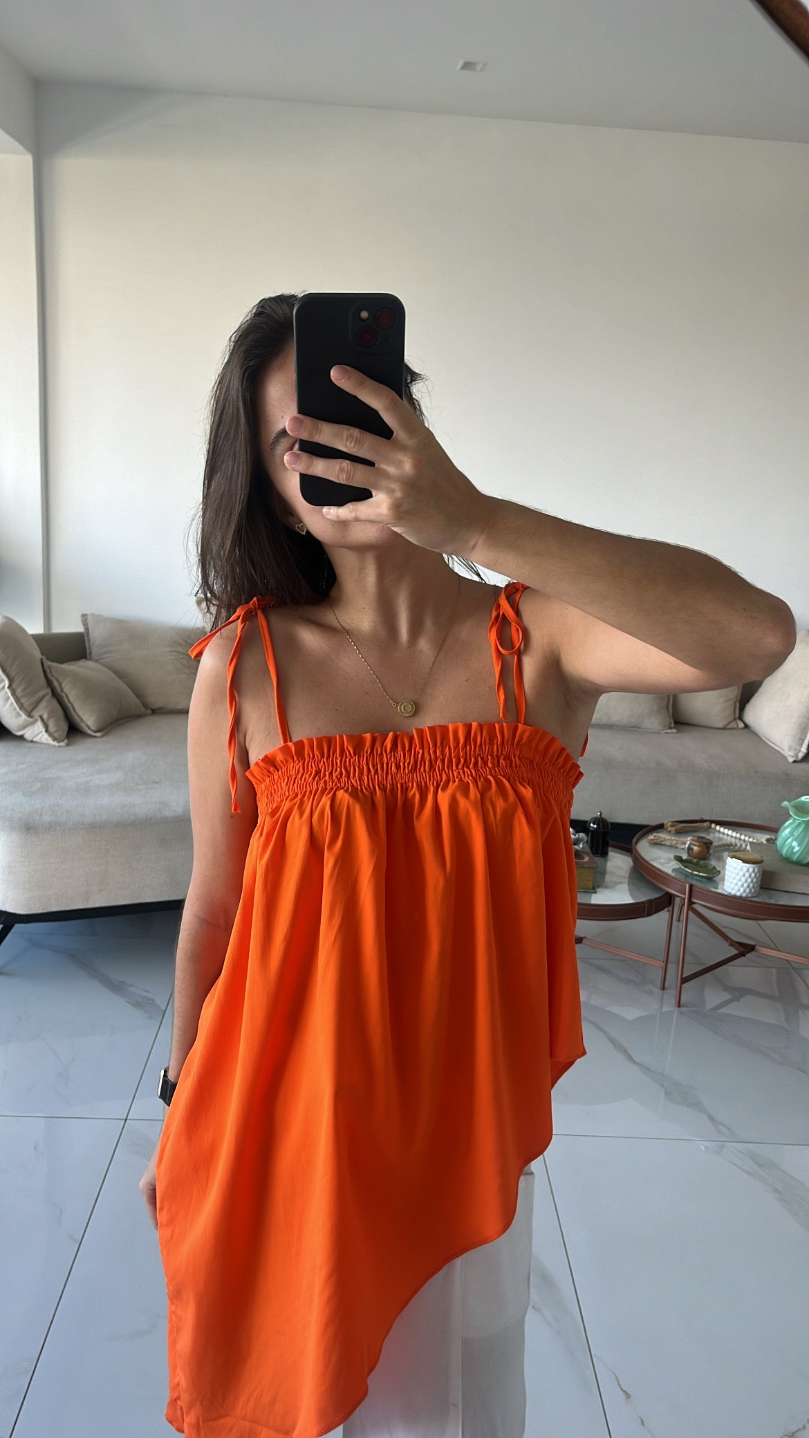 Bata assimétrica laranja