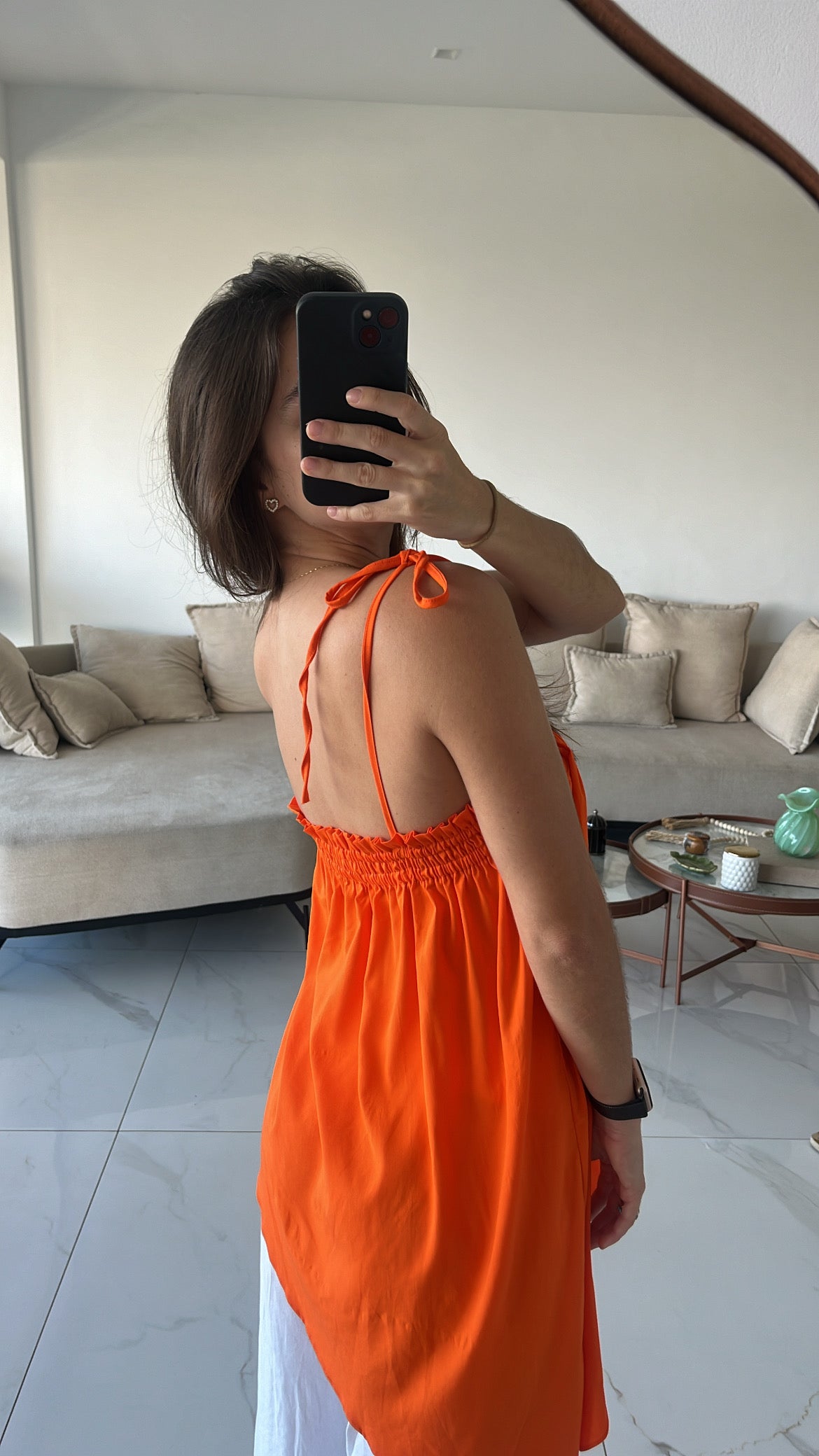 Bata assimétrica laranja
